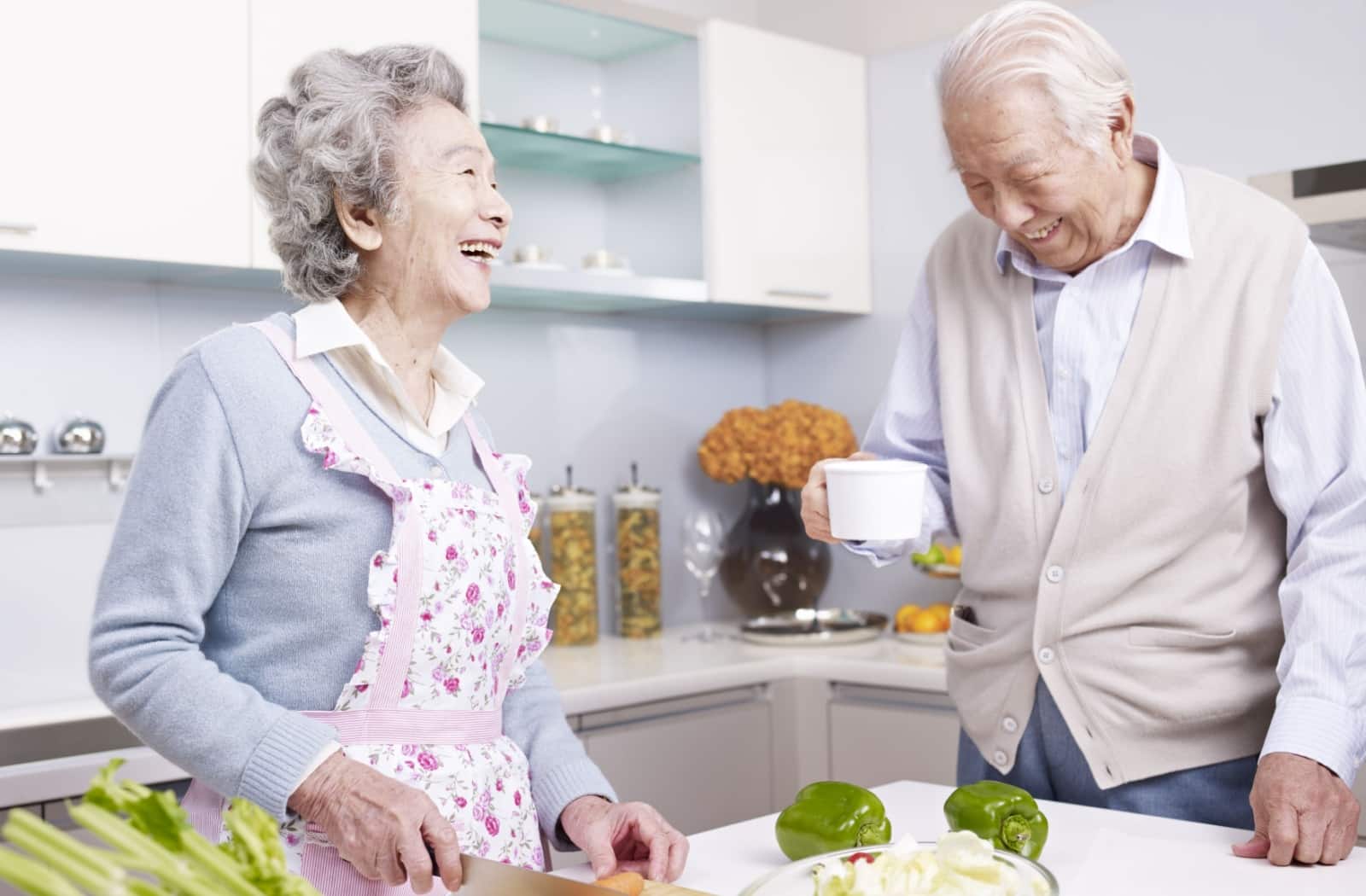 An older couple is enjoying independent living where they can access support if necessary.