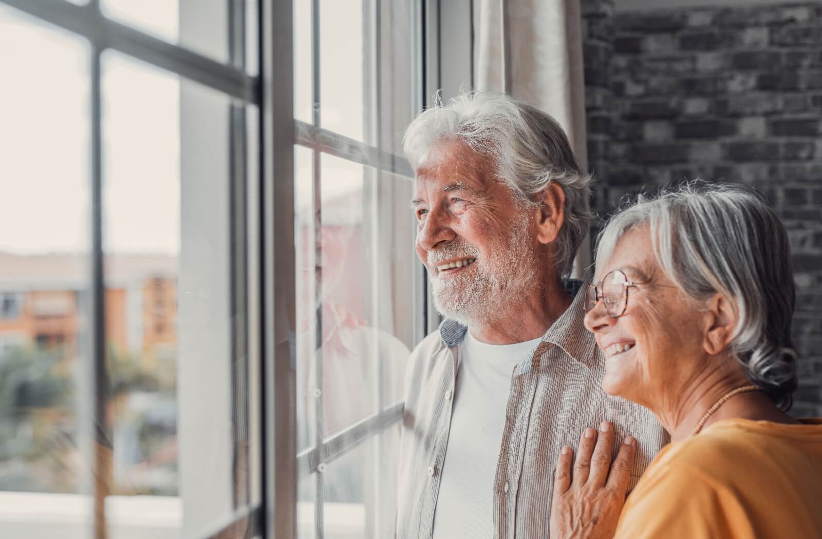 Happy couple settled in their new home at a senior living community in Woodstock, GA.
