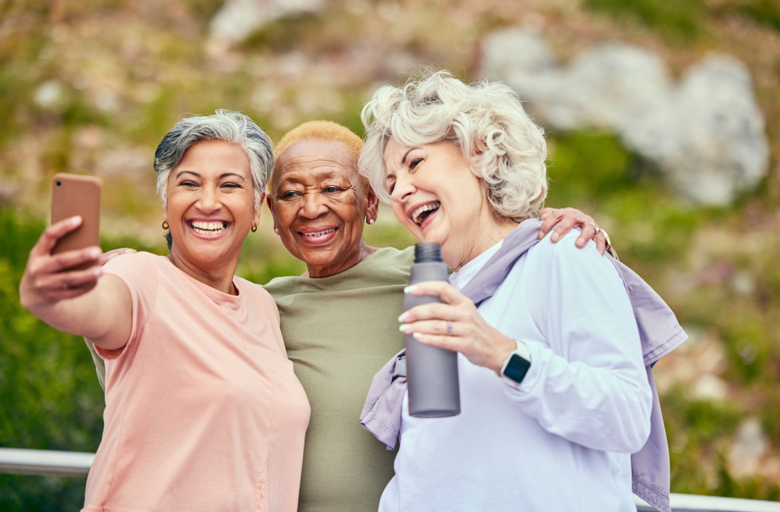 A group of active living friends taking a selfie after their outdoor activity.